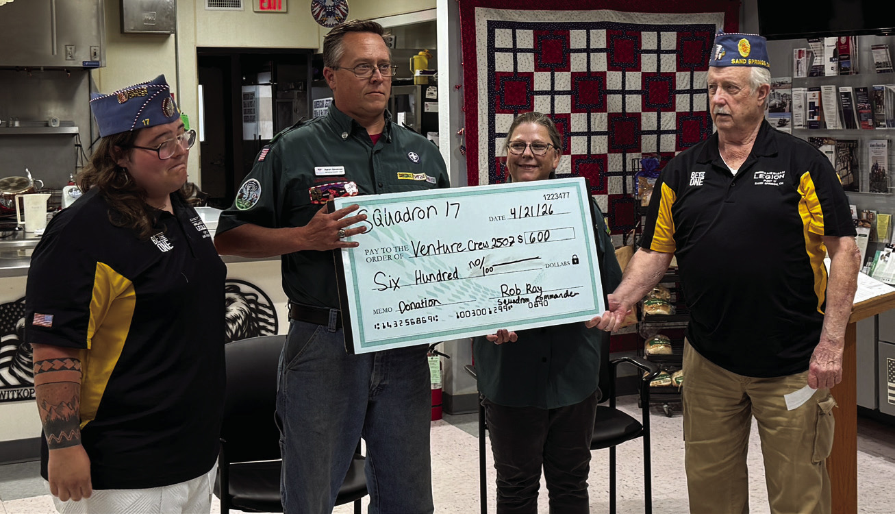 Venture Crew #2507 is presented with $600 from Sand Springs Sons of the American Legion (SAL) at the Veterans Center on April 21. Pictured from left are SAL Treasurer Andrew Miller, Venture Crew member Aaron Goodman and Brandy Goodman, and SAL Squadron Commander Rob Ray.