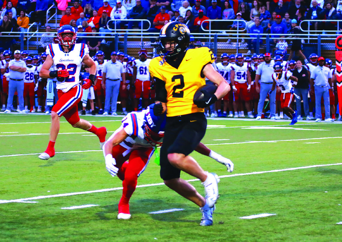 Sandite Junior Dominic Forbes runs past a Bixby defender.
