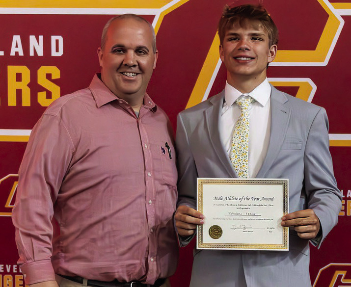 Male Athlete of the Year Dawson Kelsey accepts his award.