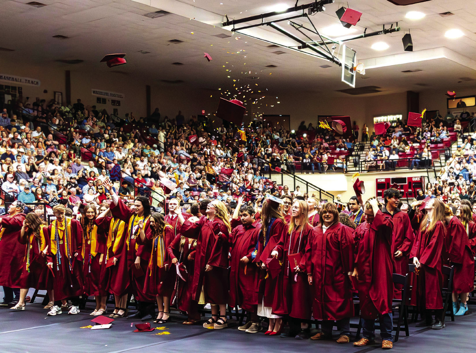 131 Cleveland Tiger graduates celebrate the official end of their high school career in the event center Saturday, May 16. Photo by John Burns