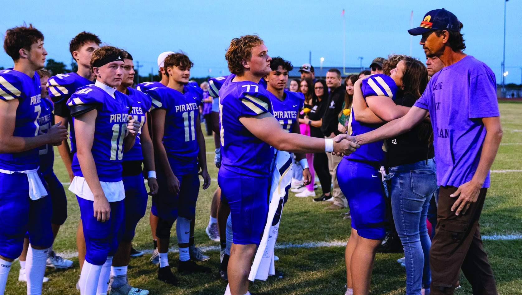 The Pirate seniors pay tribute and respect to the parents of Leland Geary, who lost his life in an accident earlier this year.