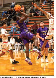 Mannford’s JJ Hindsman always finds creative ways to score. Photo by John Burns