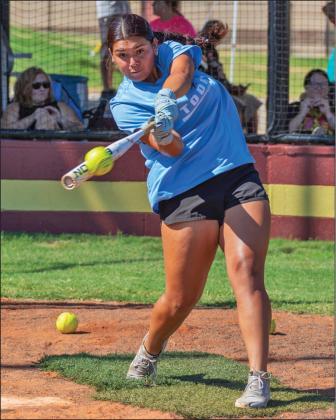 Taybor Moss wins the girls division of the HR derby. Photos by John Burns