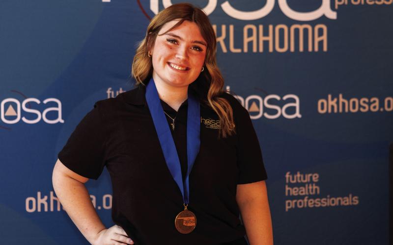 Earning 1st place in Speaking Skills for secondary students is Kaydence Sill, Mannford.