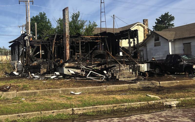 A house fire on April 22 overtook and destroyed a home on Ohio street in Drumright. The nearby property received limited damage due to action taken by Drumright Fire Department members and mutual aid departments. Photo by J.D. Meisner.