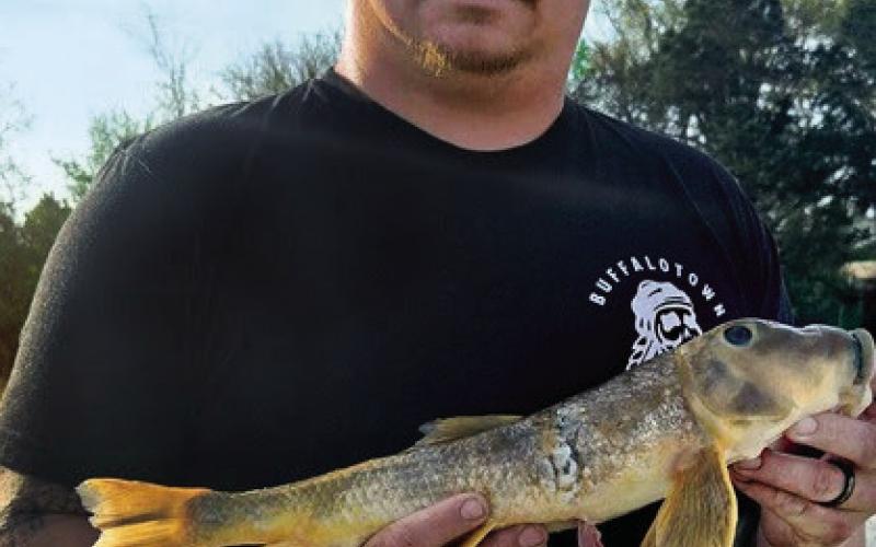 Right: Eric Dean Sanders of Tahlequah caught the new unrestricted state record (gigging) northern hog sucker. This record fish was caught on 3/31/2026 in the Illinois River in Cherokee County The fish weighed in at 2 pounds 4 ounces, 16.75 long, 9.25 girth.