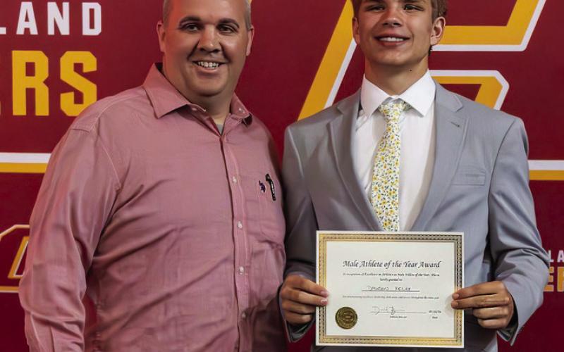 Male Athlete of the Year Dawson Kelsey accepts his award.