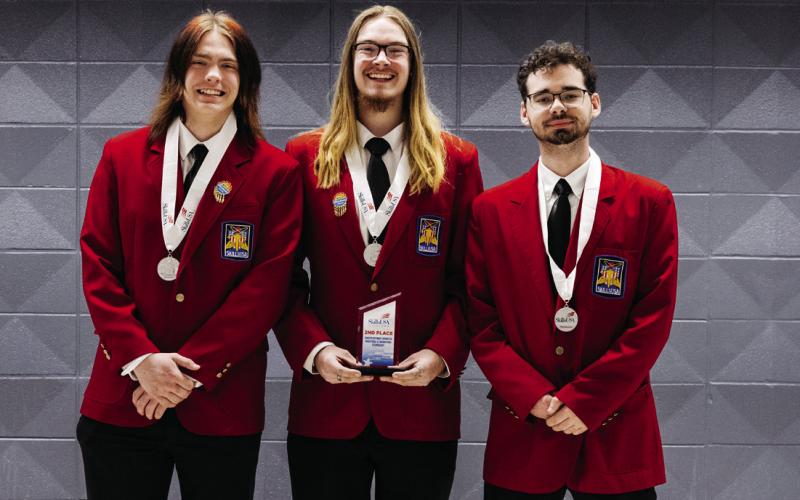 Earning 2 nd place in Career Pathways Industrial and Engineering Technology for secondary students is (L-R): Chance Pearson, Cleveland; Noah Gustafson, Mannford; Cameron Thompson, Mannford.