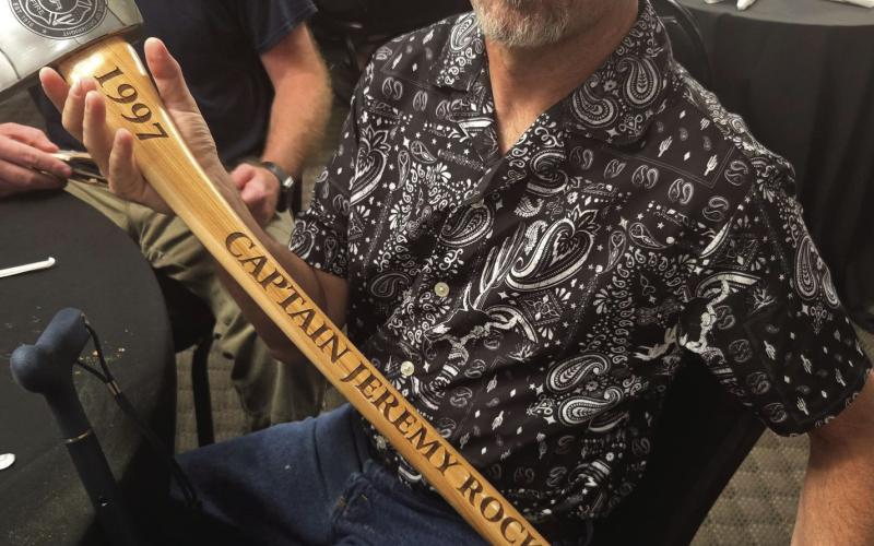 Drumright Fire Department recently honored retired Captain Jeremy Rockhold for 27 years of service during their annual banquet. Additionally Jesse DeShazer was presented with the Wade Guyer 2025 Firefighter of the Year award and Derek Jackson was presented with a previously awarded plaque for Firefighter of the Year. Pictured is Rockhold holding an axe with his name, years served, and the Firefighters’ emblem — a traditional gift among the fire service community.